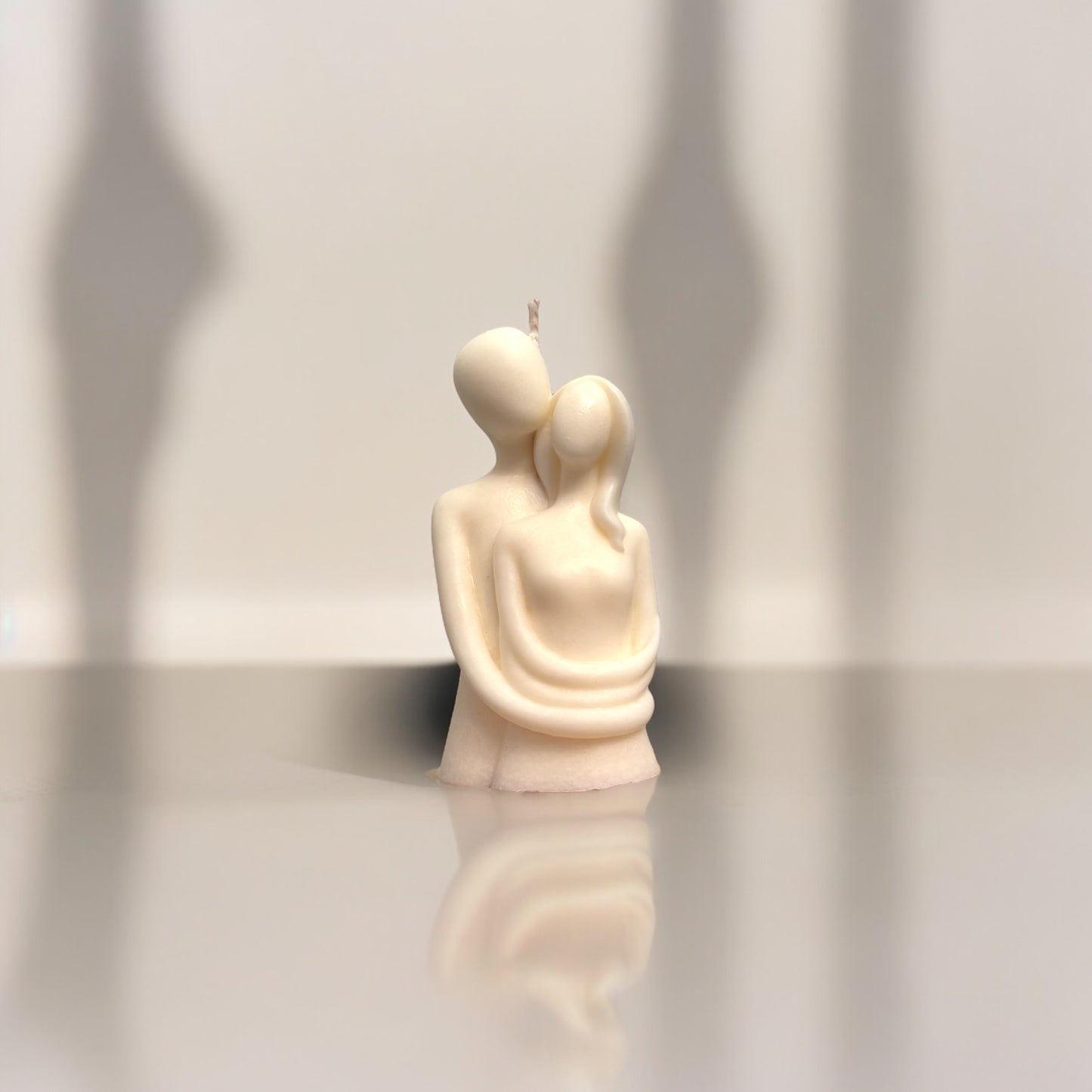 Embracing couple candle
