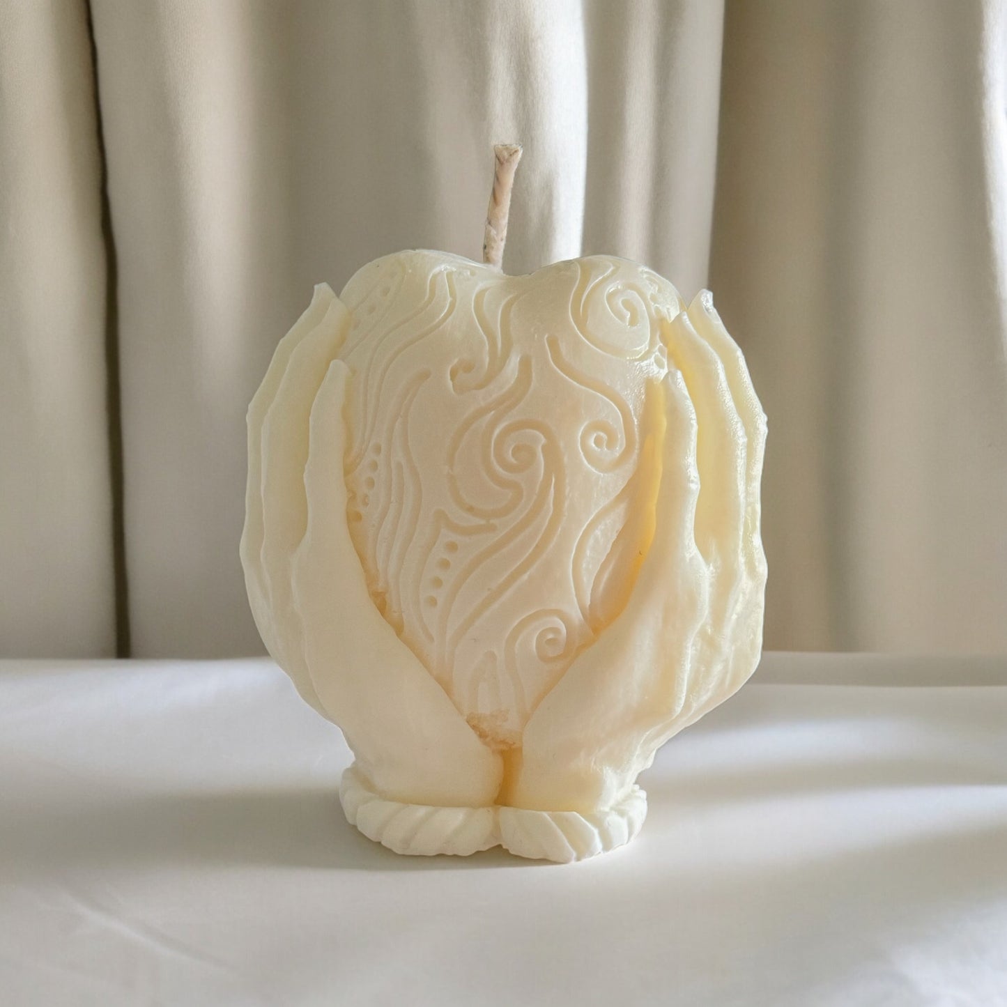 Holding Heart Candle