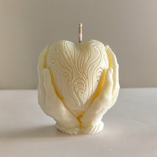 Holding Heart Candle